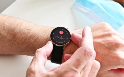 Montre connectée affichant un tracé cardiaque au poignet